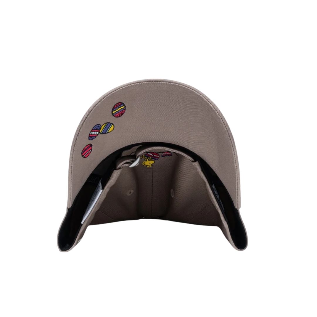 Topi Snoopy 9FORTY PEANUTS Easter Woodstock Ash Brown Ukuran 56.8–60.6cm